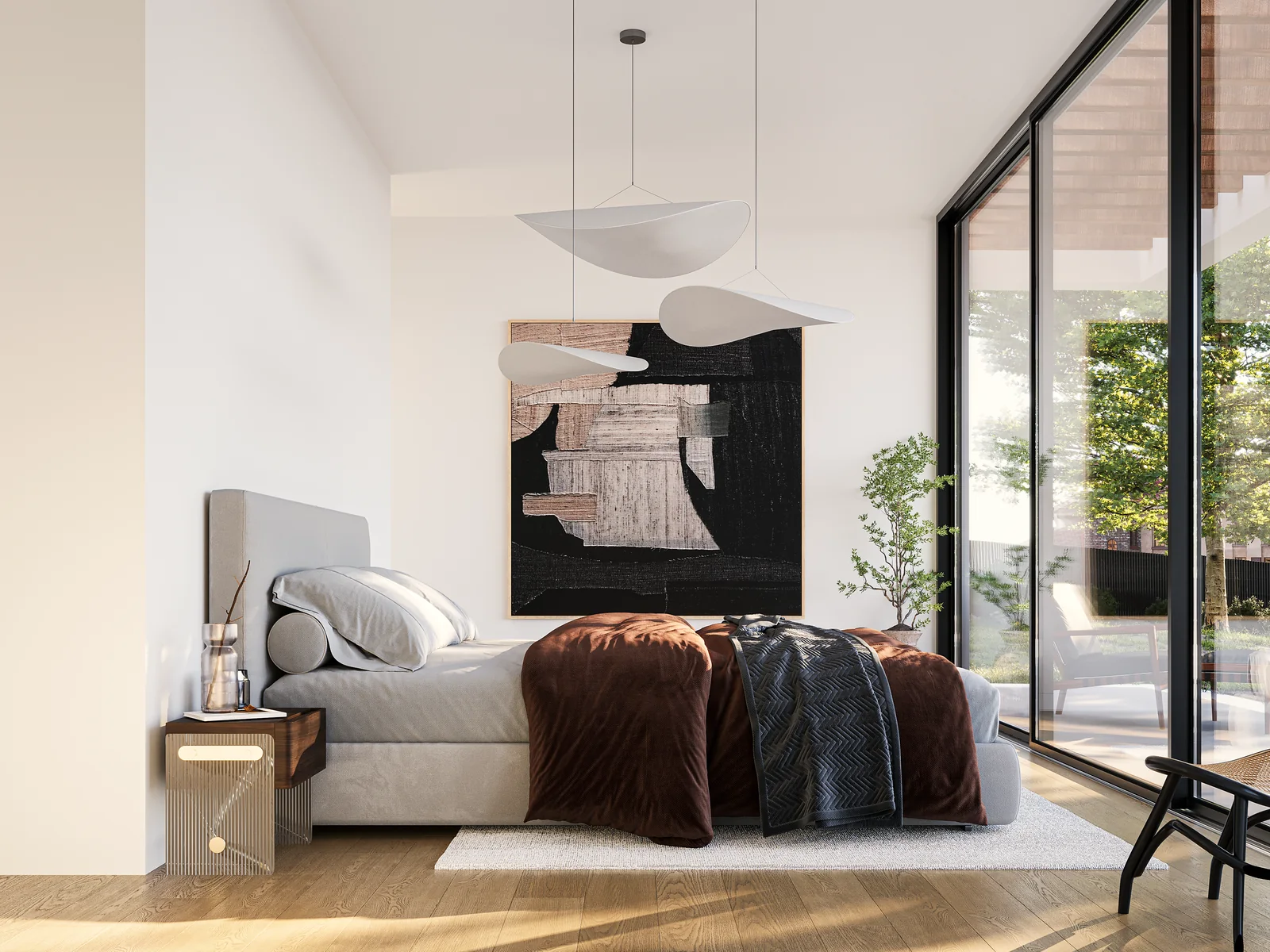 Um quarto com cama baixa, uma obra de arte por cima e um pano de vidro sobre o terraço.