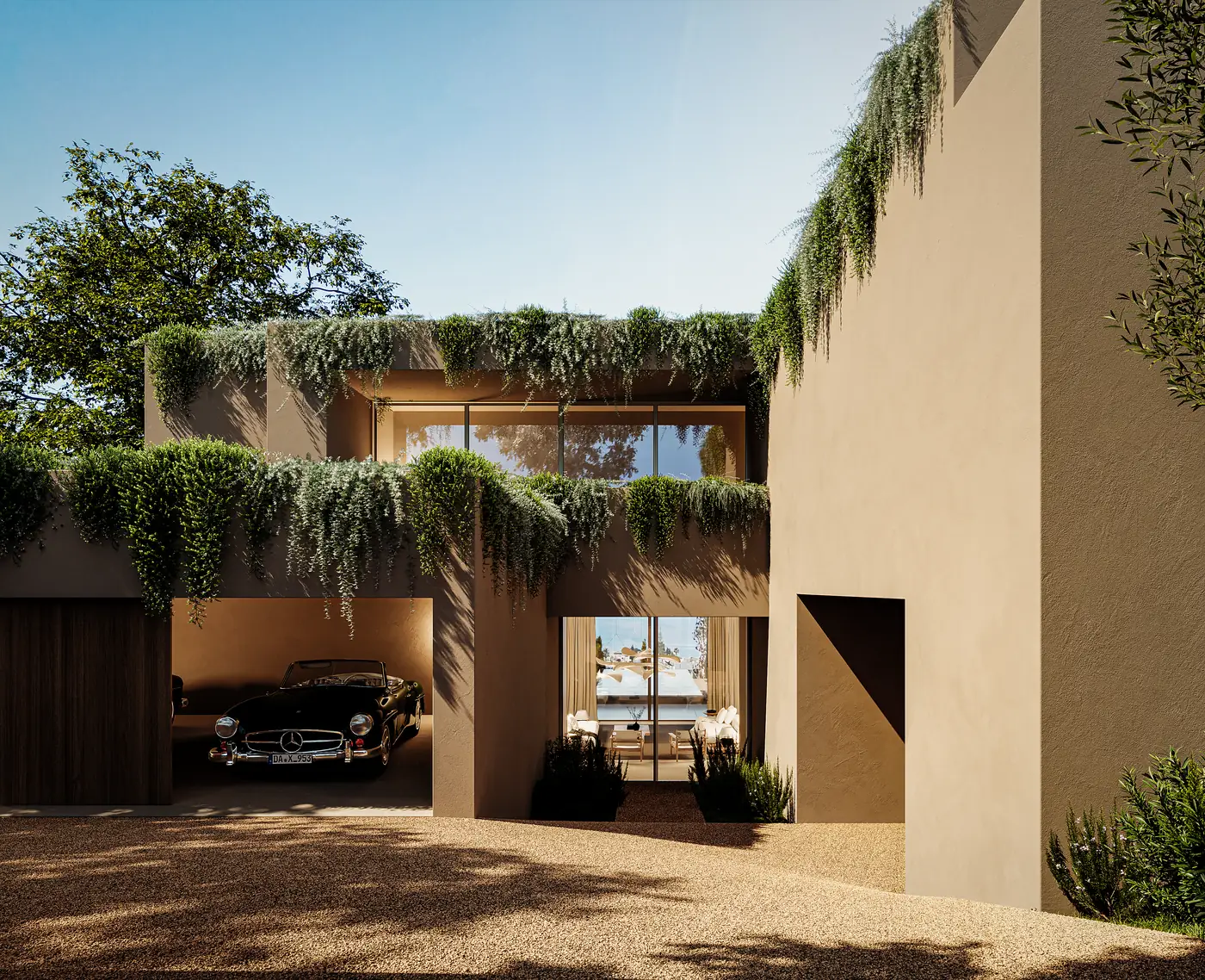 A entrada: um vão coberto rasgado entre dois volumes rebocados com um carro debaixo, plantação pendente do parapeito por cima e a casa a deixar ver-se de lado a lado até ao jardim.